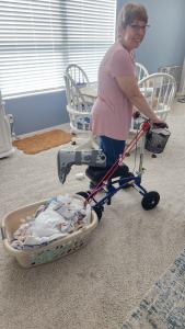  using a Orthomate All-Terrain Knee Scooter from  Ormond Beach Florida May 2024